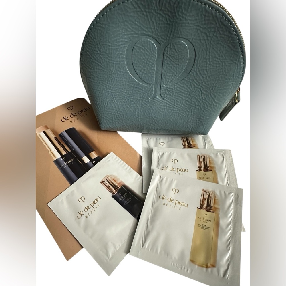 Cle De Peau Cosmetic Pouch with 5 samples 3x Lotions Serum & Concealer